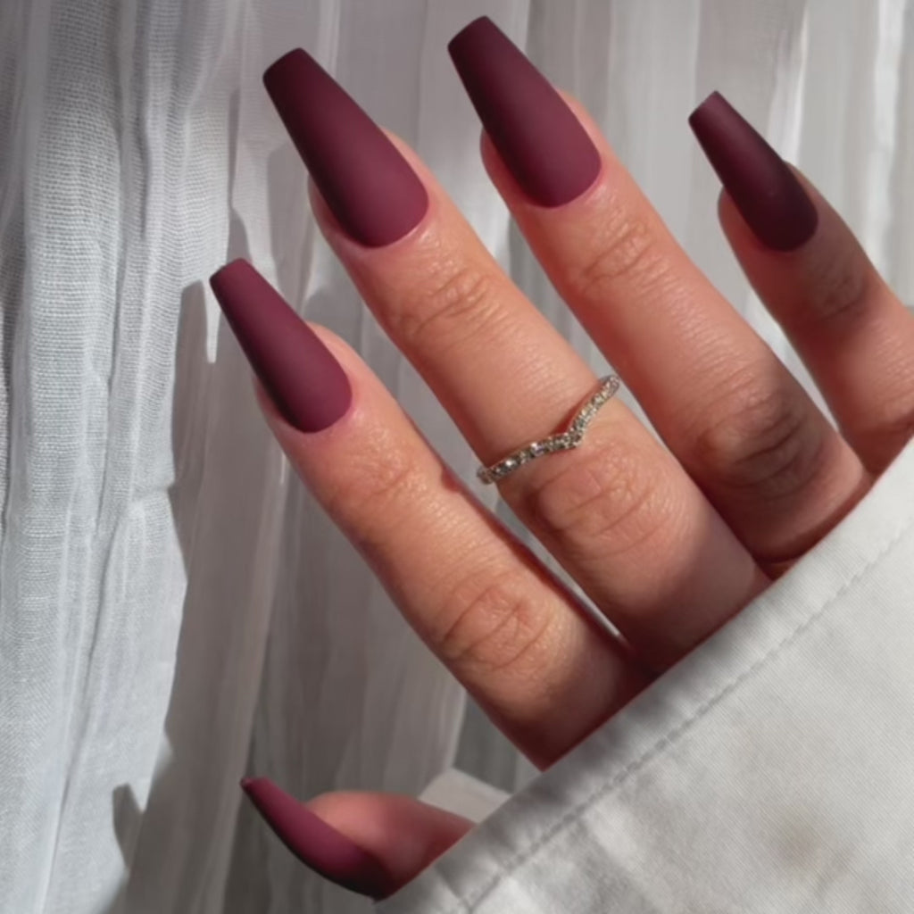 matte burgundy nails with design